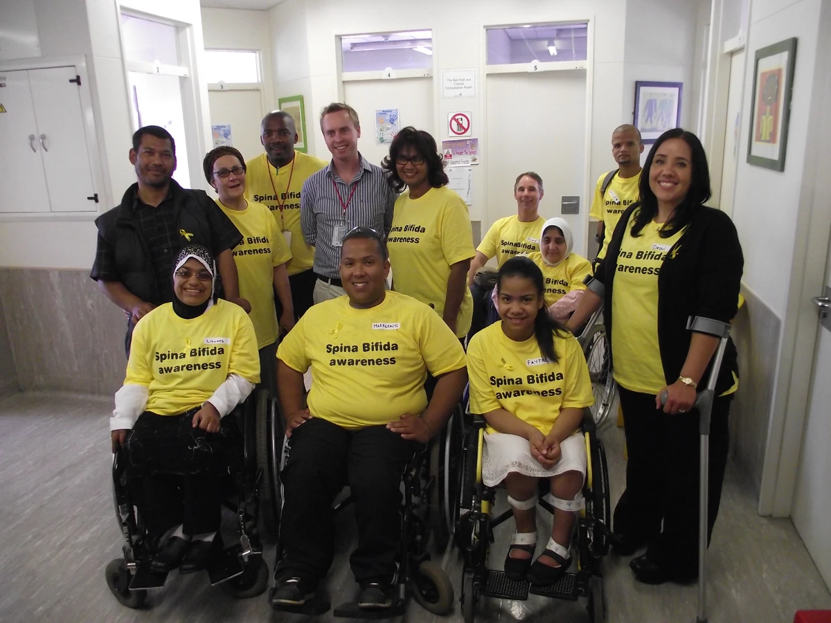 Second outdoor field photo from an Asbah SA community event — participants in a natural South African landscape