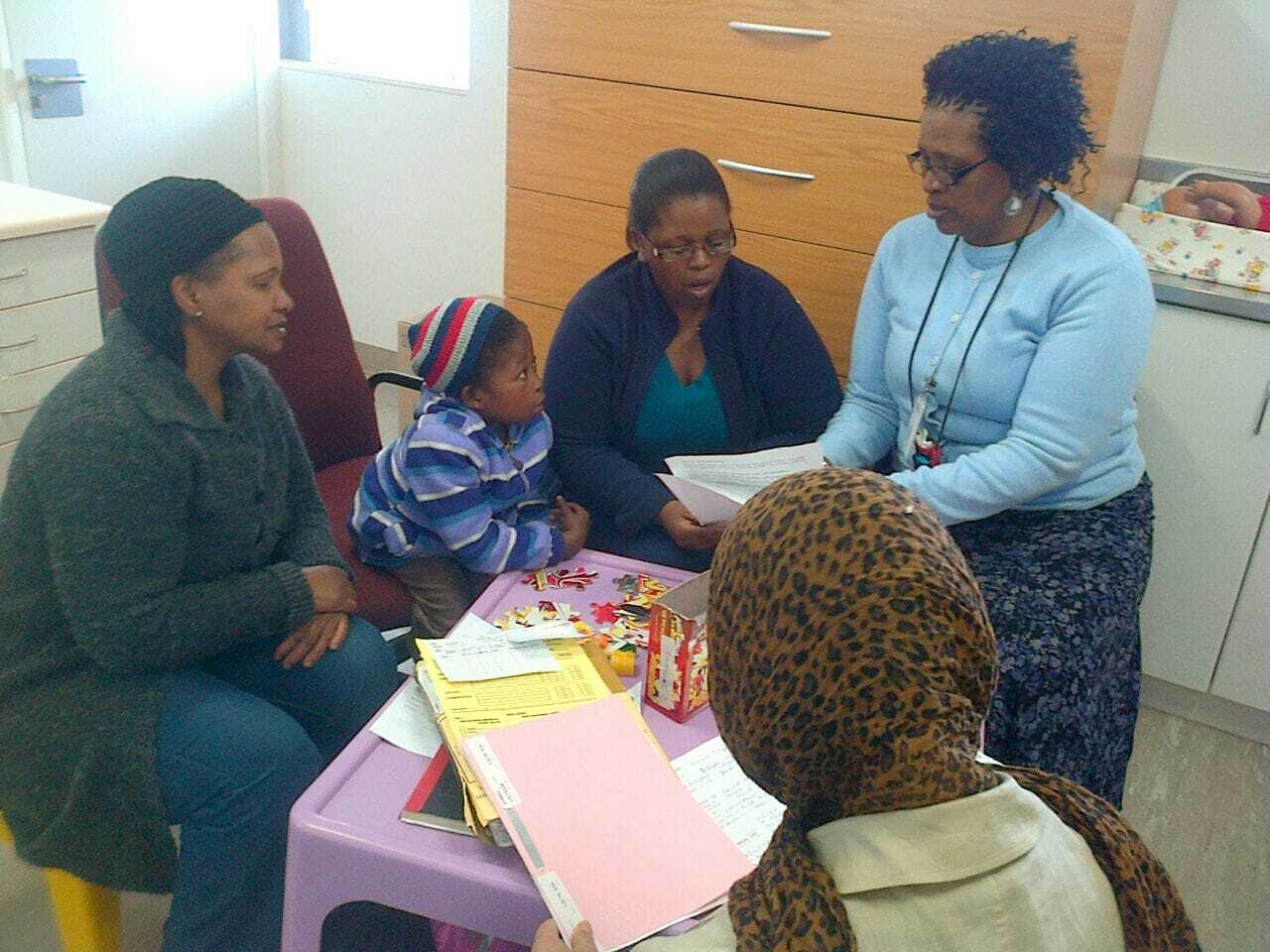 Asbah SA community gathering in June 2021 — families, children, and volunteers posing together outdoors